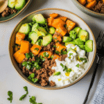 ground beef sweet potato cottage cheese bowl served in a white bowl