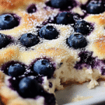 Blueberry cottage cheese breakfast bake served on a rustic plate